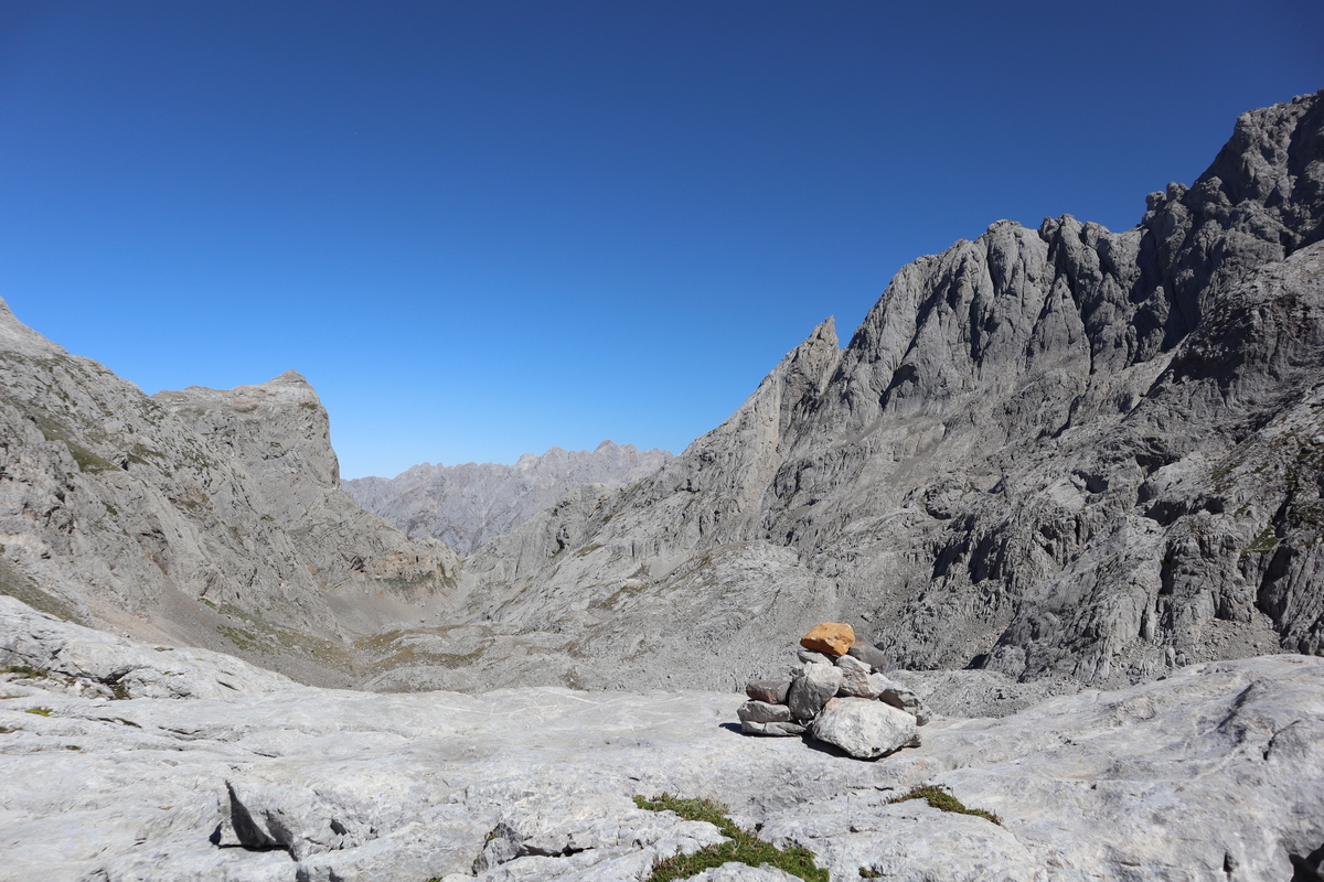 mountain path in valley leading to a pass