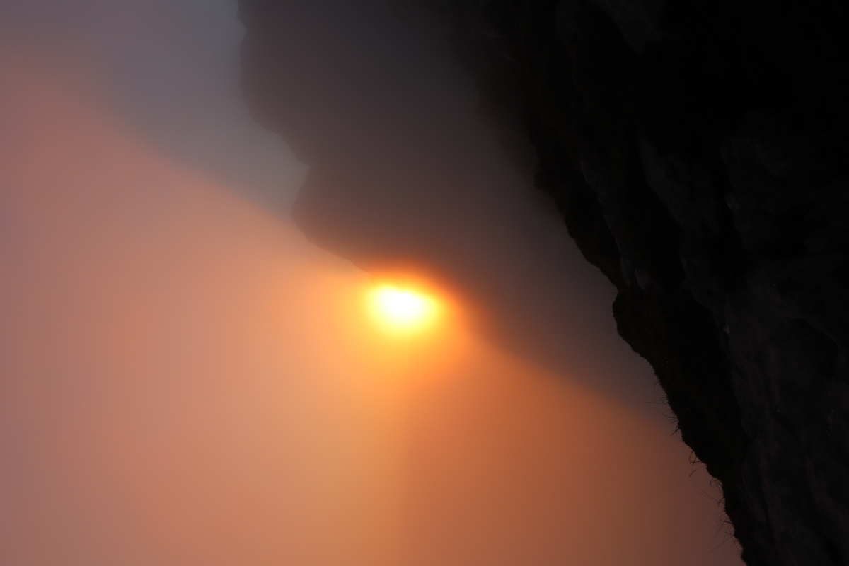 sunset behind mountain edge